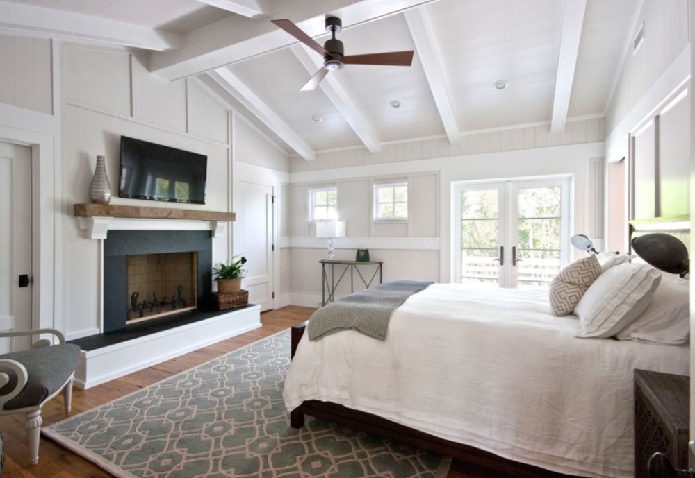 Inspiration for a timeless bedroom remodel in Charleston with white walls