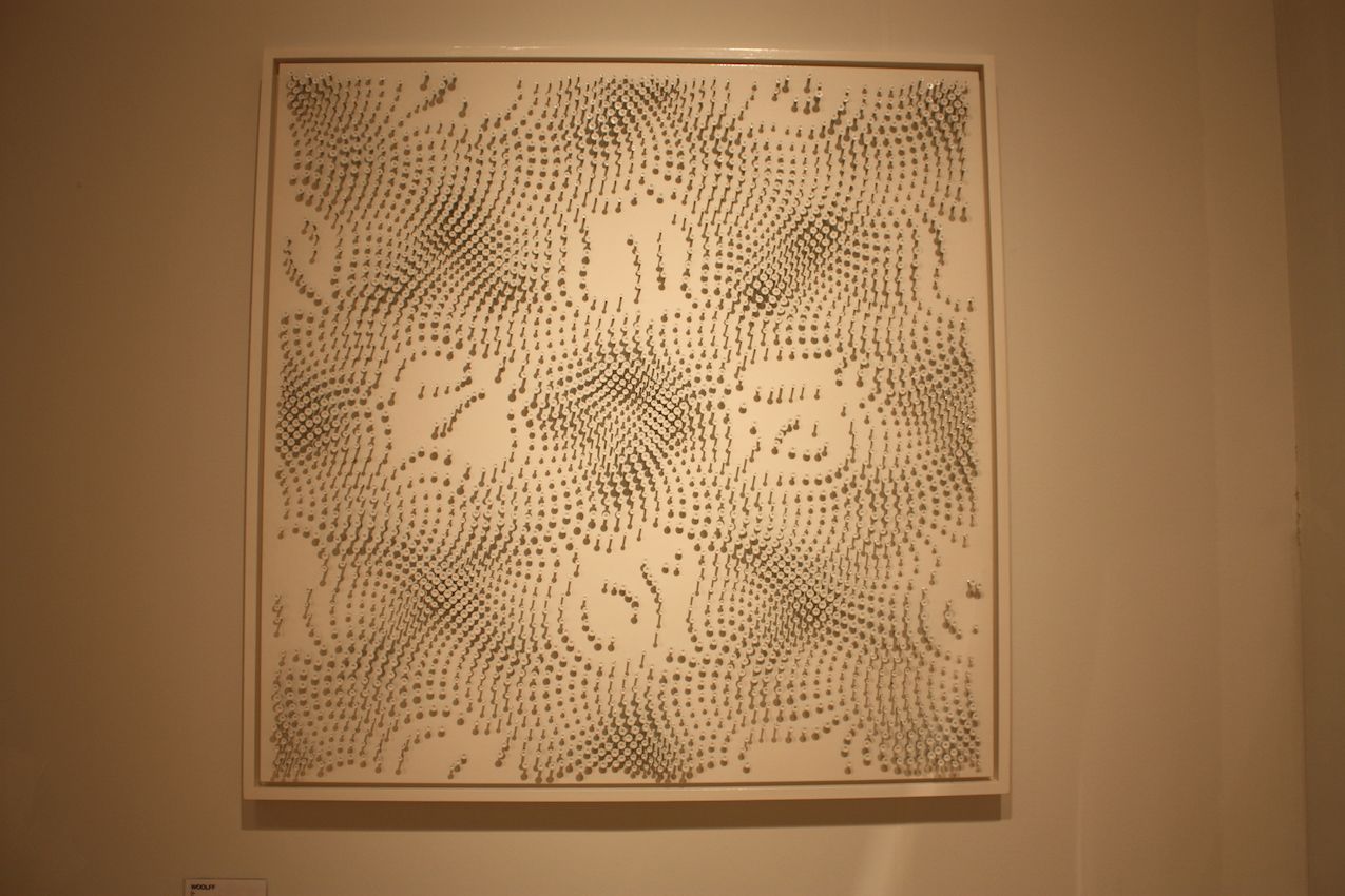 The feeling of movement and change is created through the spacing of the screws.