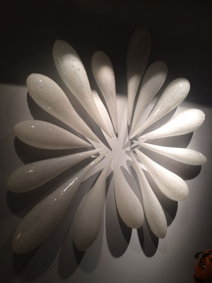 Jeff Zimmerman's wall hung "Splash" sculpture is made of 17 pieces of hand-blown baking soda glass.