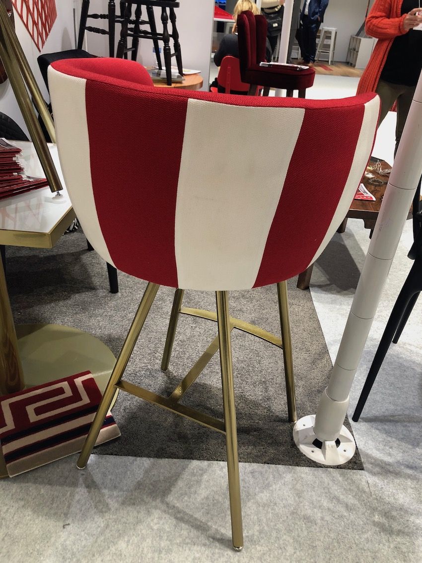 Wide stripes including a bold red make a sleek chair special.