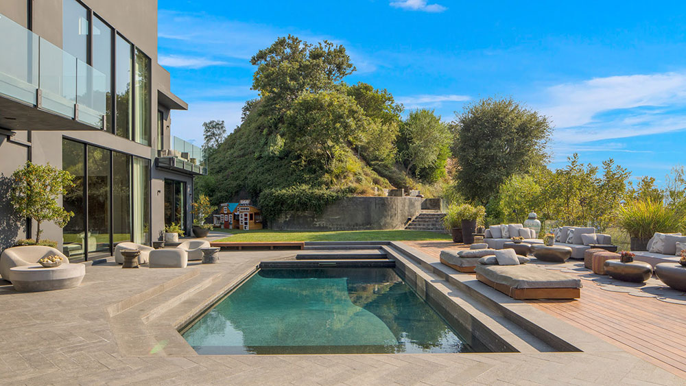 John Legend and Chrissy Teigen Living room patio pool