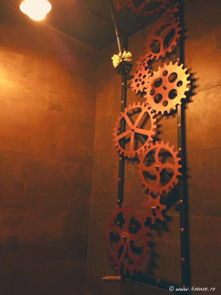 In here, the walls and ceilings are decorated with cog wheels