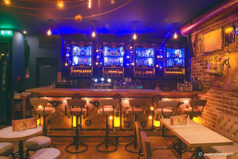 The bar front is decorated with cog wheels, chains and lights
