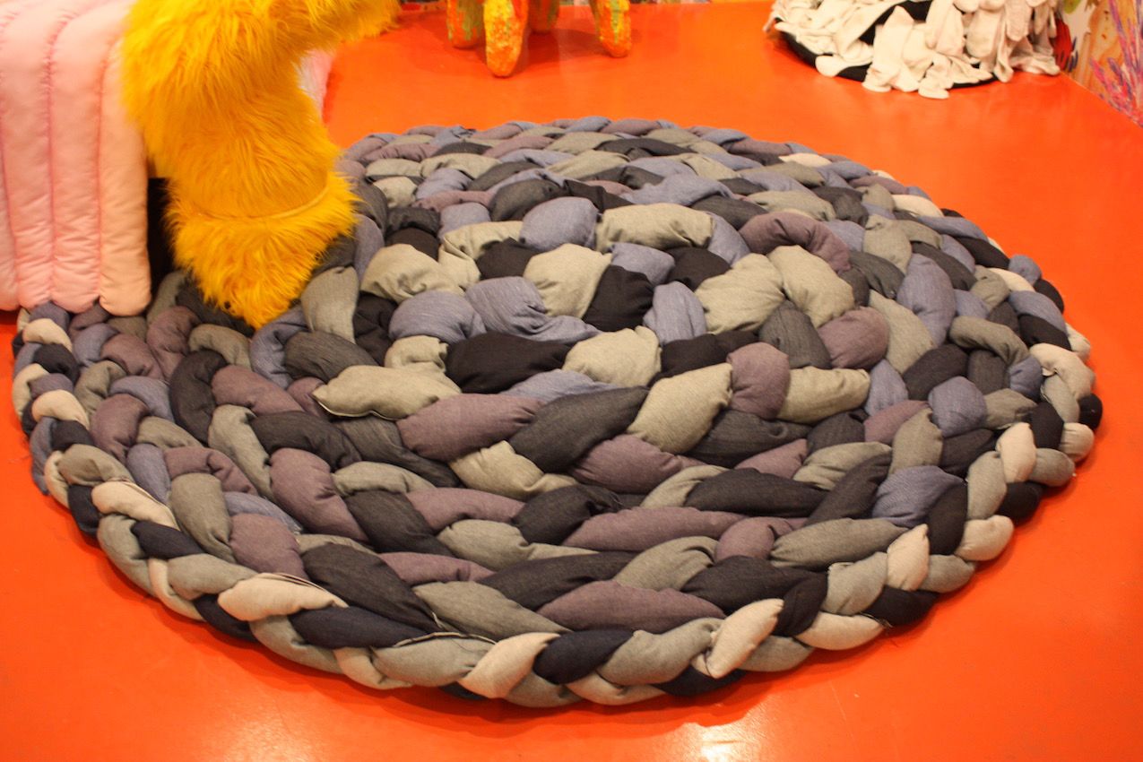 This braided rug is pouffy and inviting...you just want to jump up and down on it.