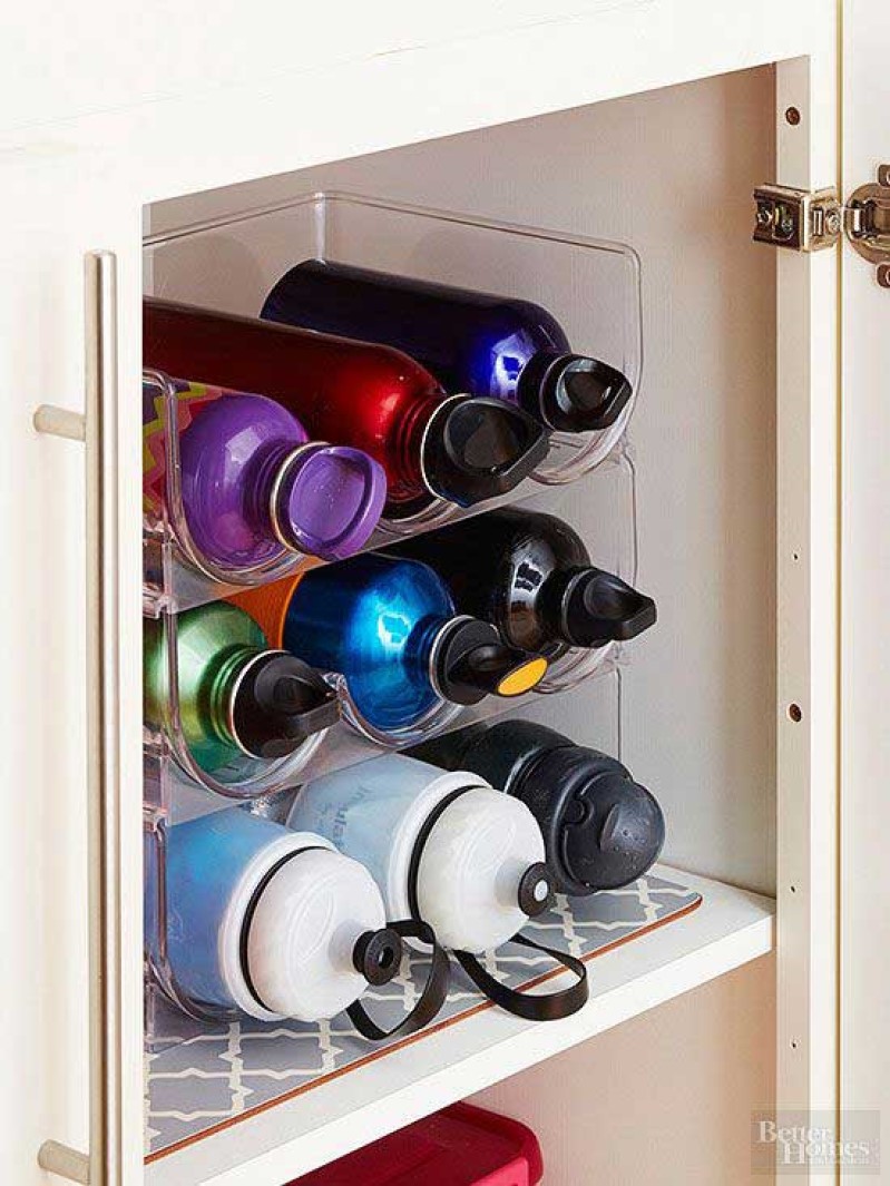 Keep Your Water Bottles Organized With A Wine Rack