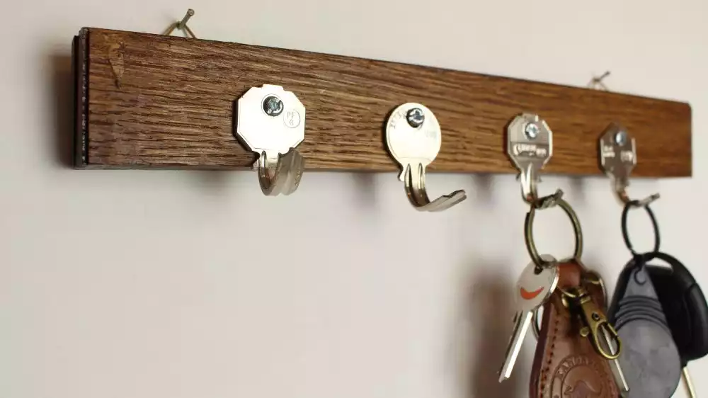 Keys Into A Key Holder For Wall