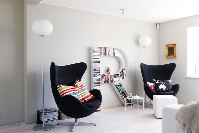 Kids room with two upholstered black egg chair