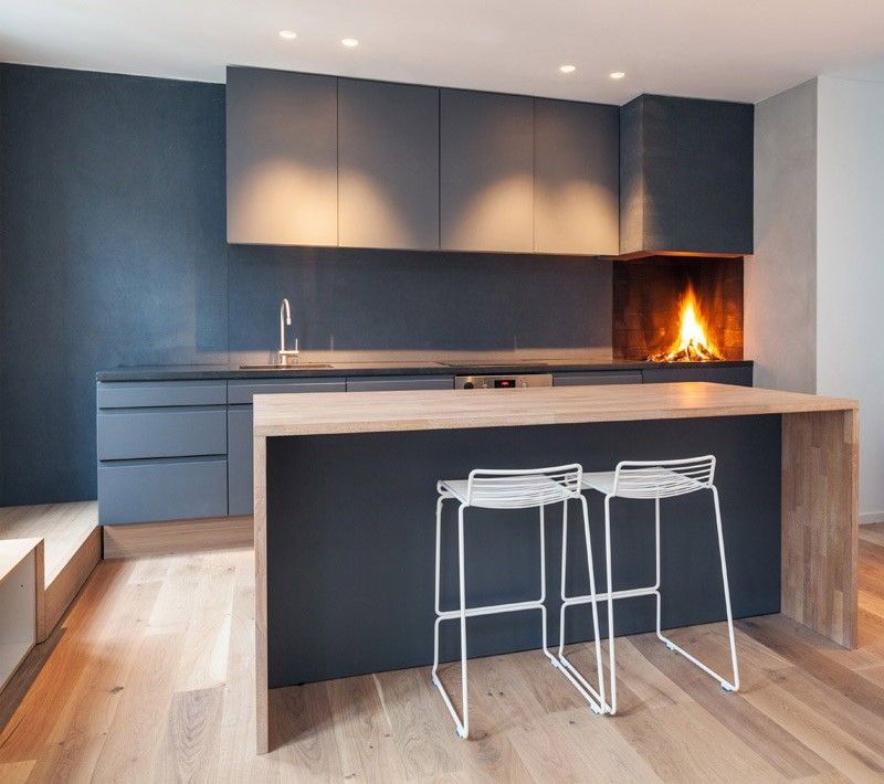 Kitchen design with a fireplace