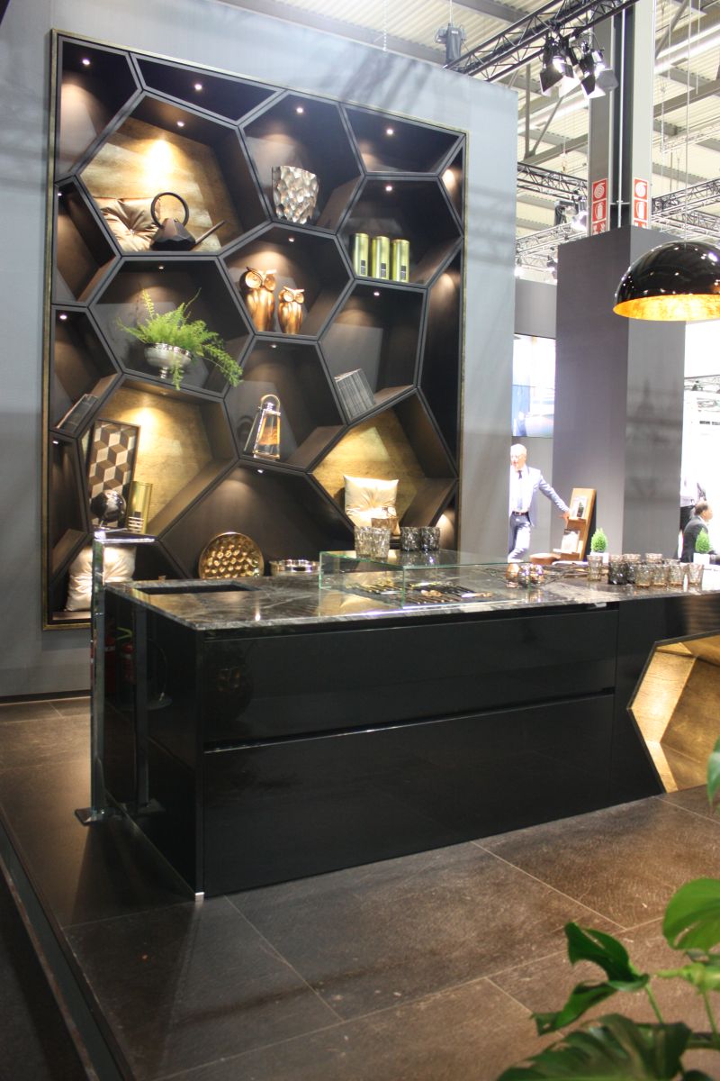 Kitchen in black with honeycomb shelves