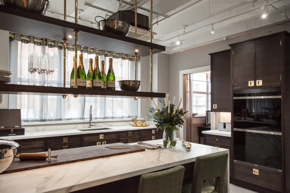 Kitchen island and hanging shelves above