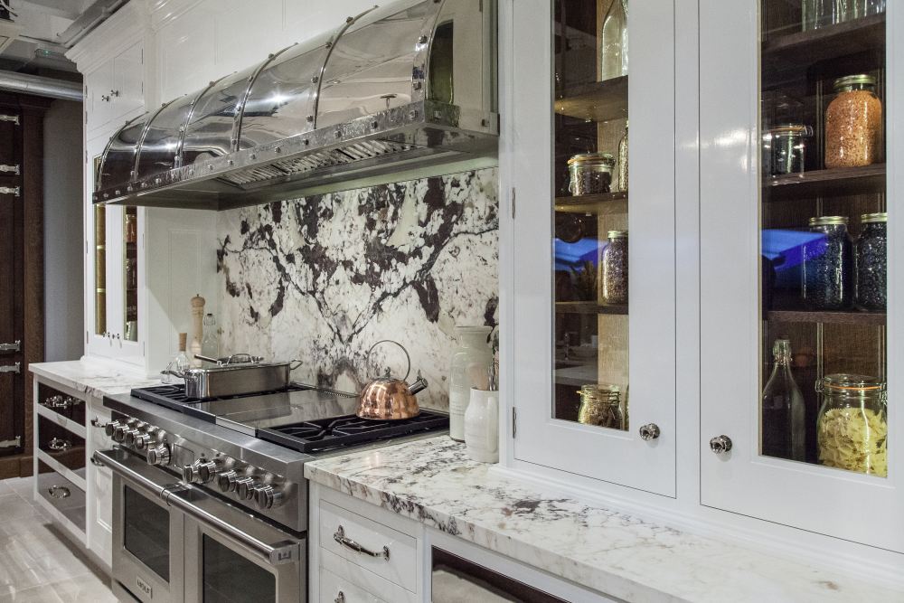 Kitchen layout interior design with white and grey marble veins