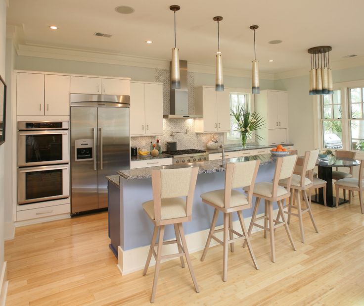 Kitchen layout with built in appliances and bamboo floor