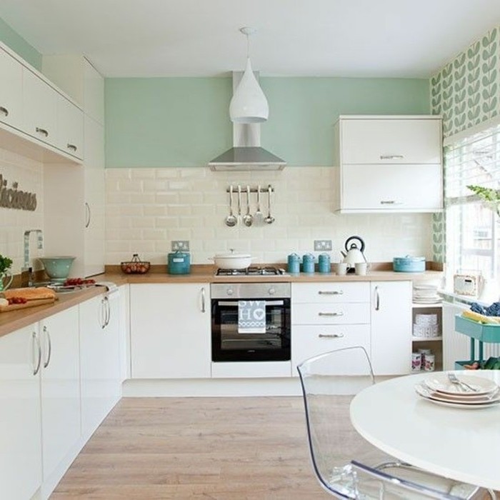 Kitchen mint green design with subway tiles