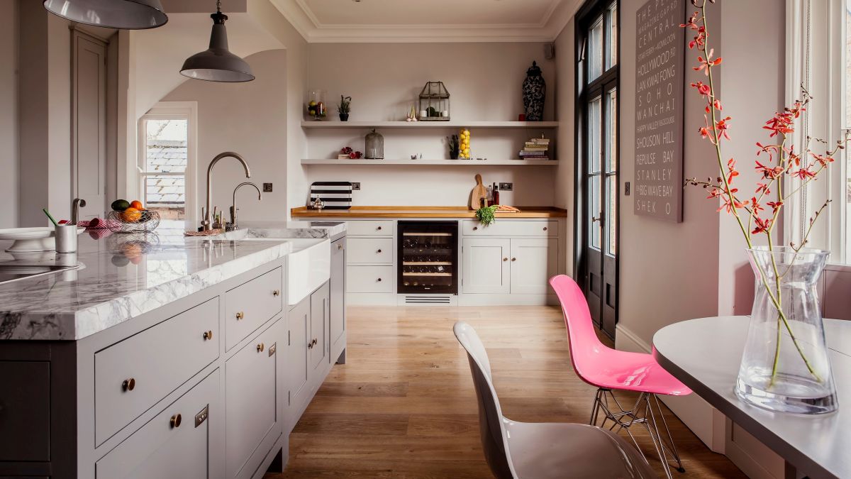 Kitchen with an accent pink chair