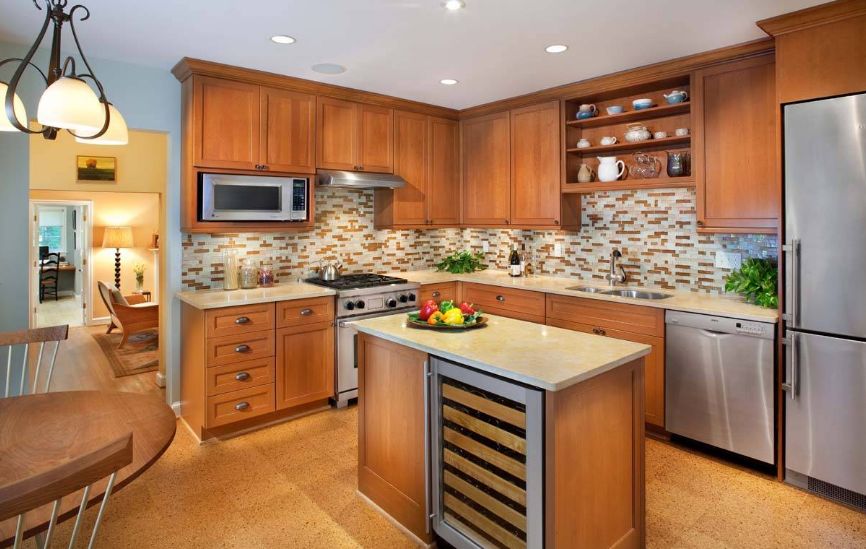 Kitchen with small kitchen that feature a wine fridge and floor from cork