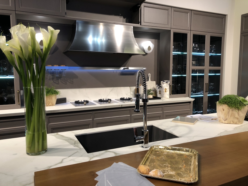 Kitchen with top kitchen cabinets in gray