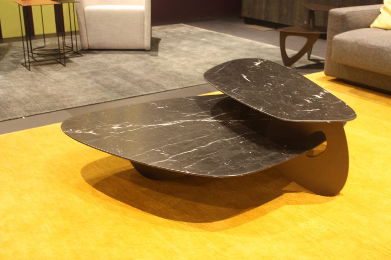 Knoll products don't disappoint and that's certainly the case with this bi-level coffee table. The rounded planes of the marble tops and the supports are marvelous.