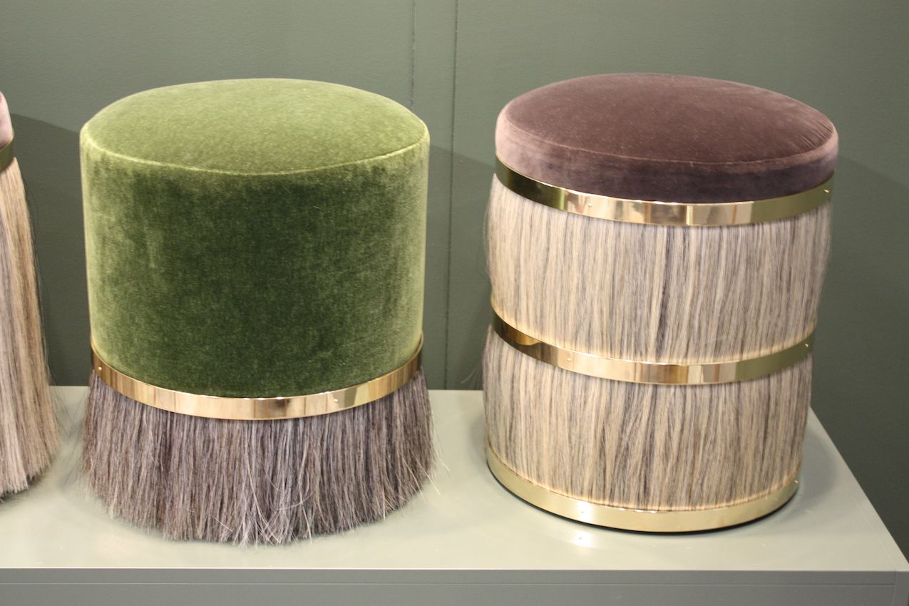 Luxe stools from Konekt feature mix velvet, gold accents and hair fringe.