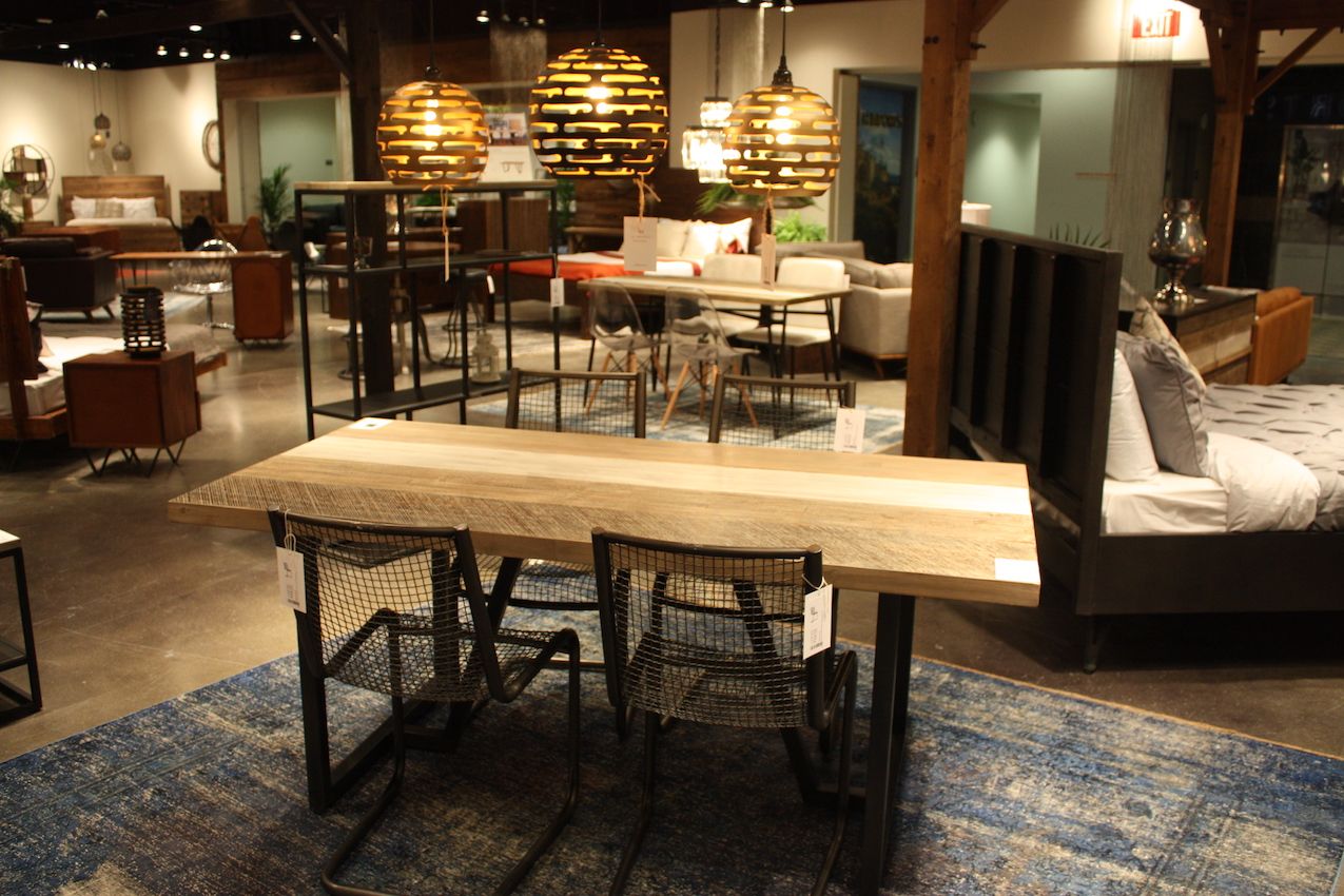 Surrounding a basic piece with edgier selections changes the decor.