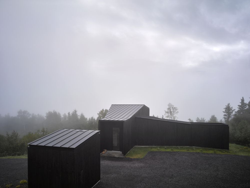 Charbonniere black cladding exterior