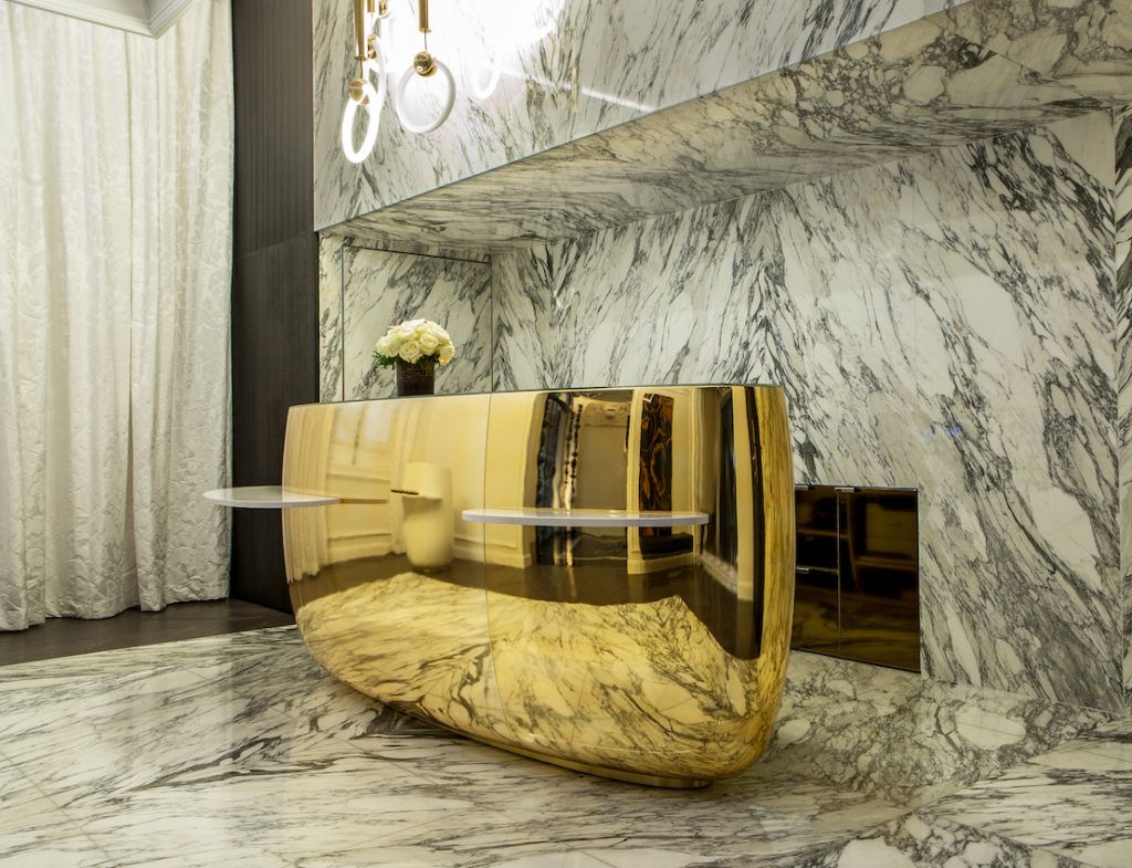 La Clef Cozy Paris Hotel - marble and gold for desk front