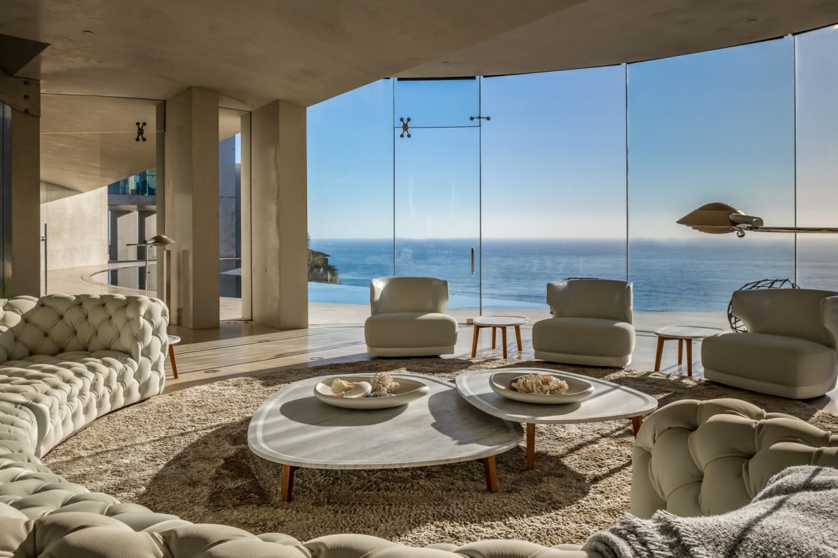 La Jolla’s Iconic Razor House curved tufted sofa