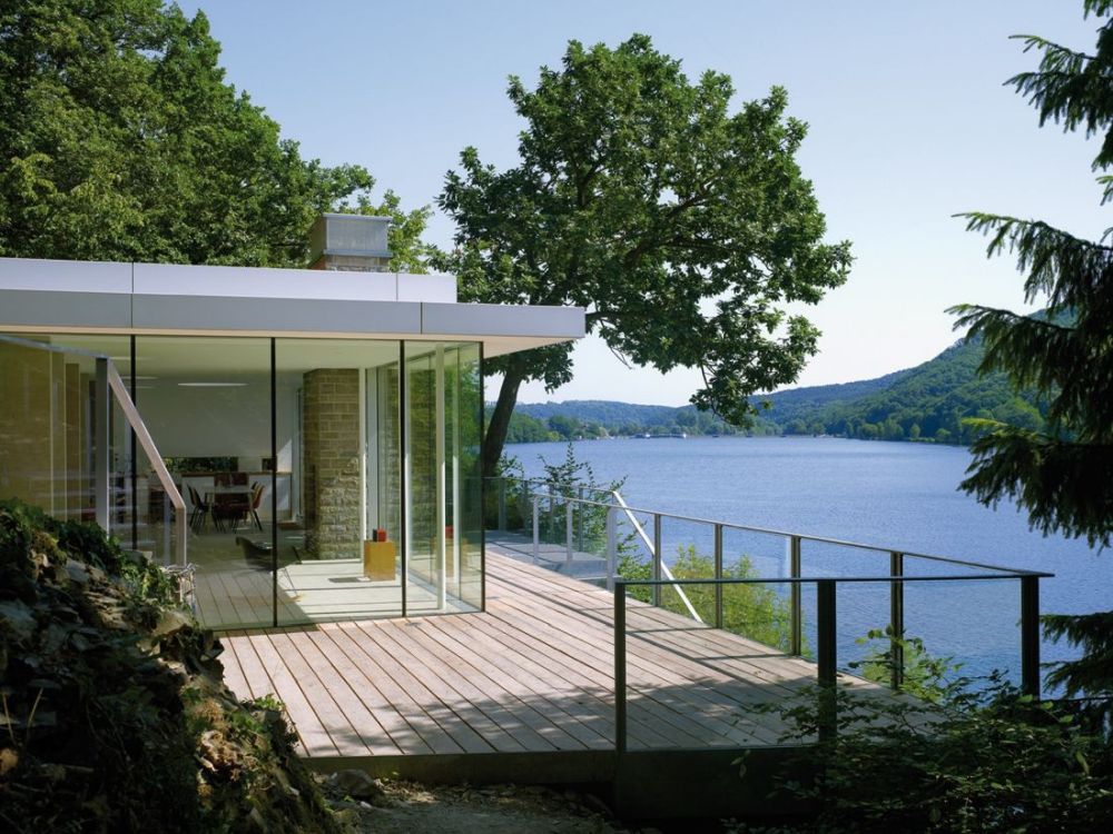Lake House Prefab with green roof and waterfront by LHVH Architekten small deck