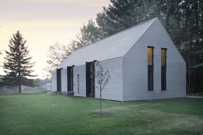 Lake cottage house with gable roof