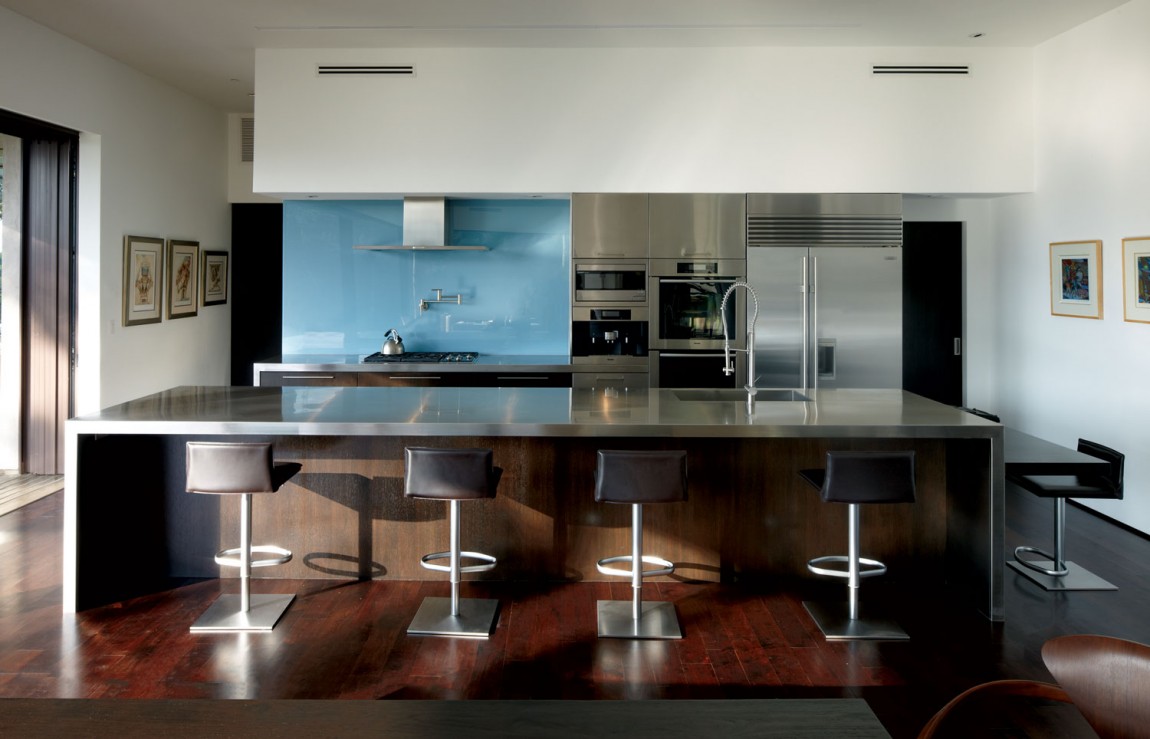 Laminate kitchen floor and glass backsplash