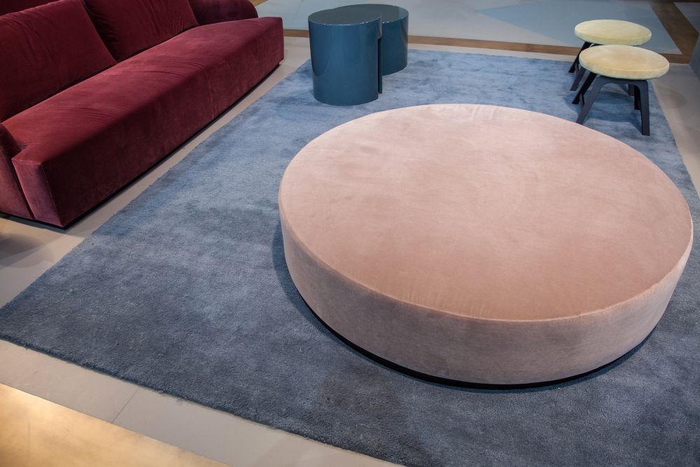 Large and low purple round ottoman