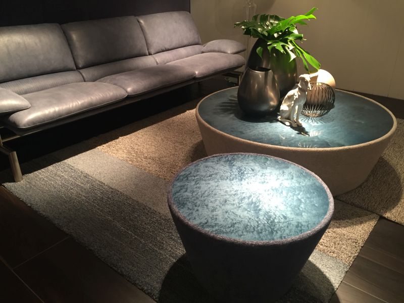 Large coffee table decor with figurines and flowers