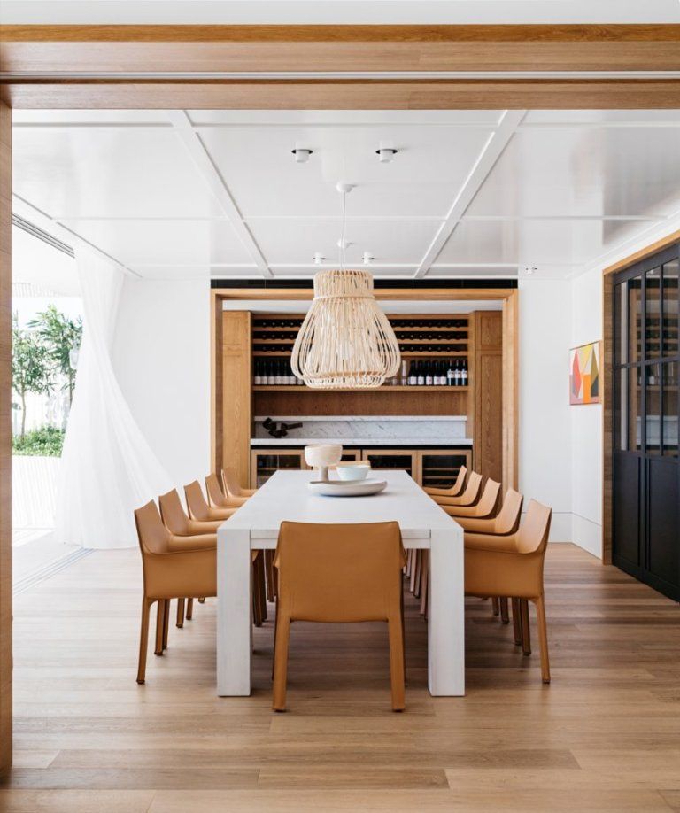 Natural materials in the light add casual texture to the dining room.