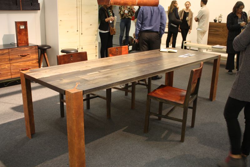 Large dining table with leather detail