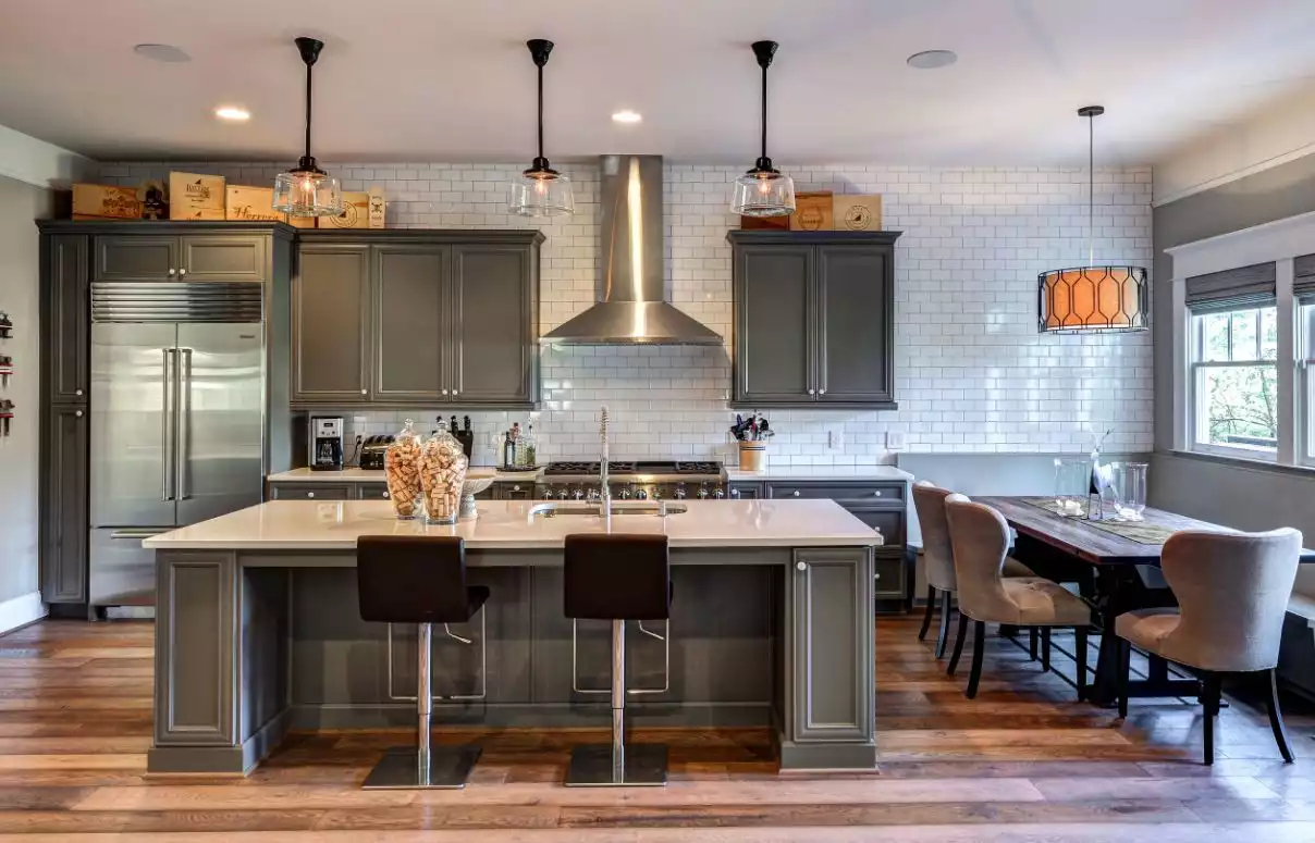 Large kitchen featuring subway tiles