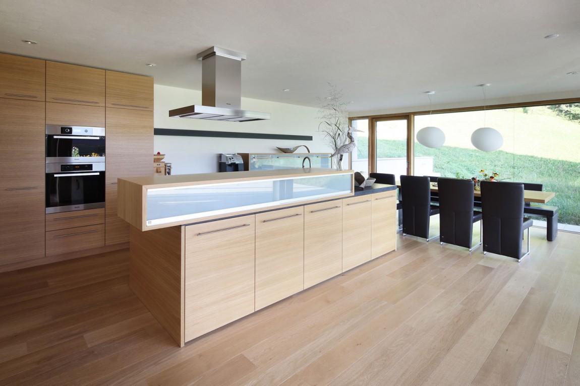 Large kitchen with laminate floor