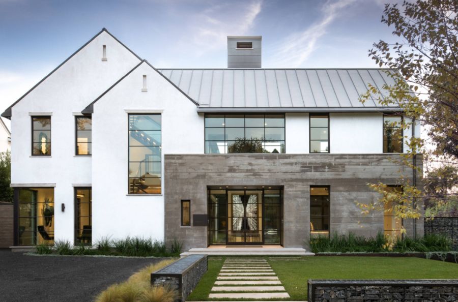 Large minimalist multicolored two story mixed siding exterior home