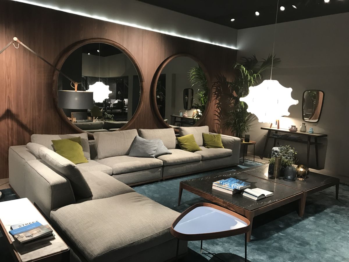 Large round mirrors and marble top coffee tables