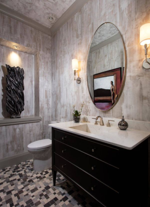 Large vanity paired with a round mirror