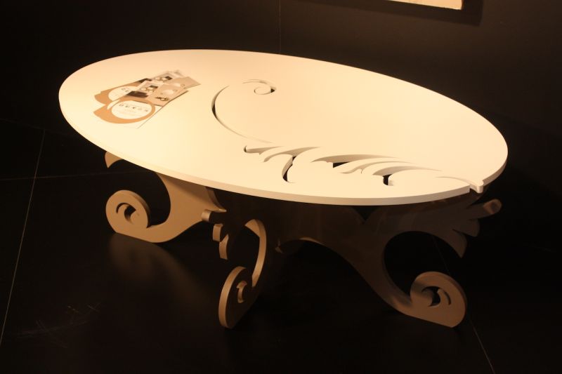 It might look like a more traditional table with fancy features, but this wood coffee table is made with the latest in laser technology. Laser Art Style of Italy creates table, mirrors and all sorts of decor using laser cutting technology.