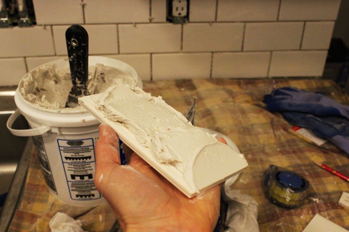 Lather the mastic on the back