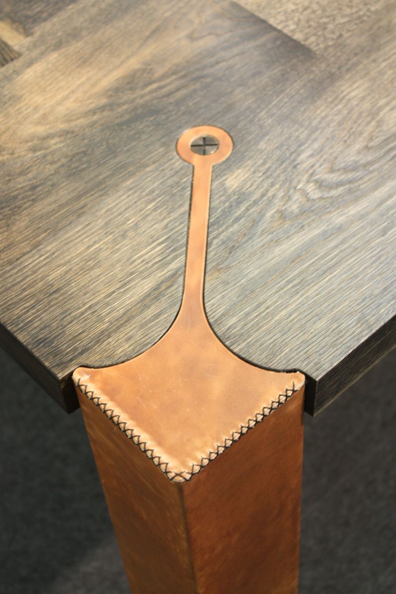 Leather legs dining table detail