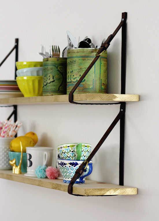 Leather straps hanging shelf