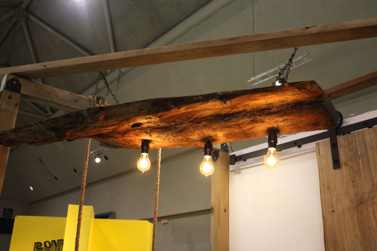 Lighting fixture from a large wood branch with edison light bulbs