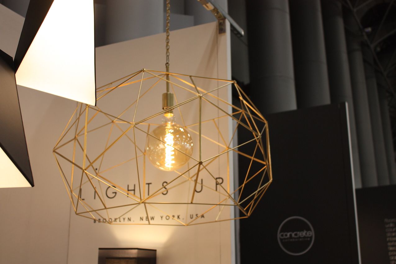 Lights Up has this bronze fixture that is all metal but far from heavy or overwrought.