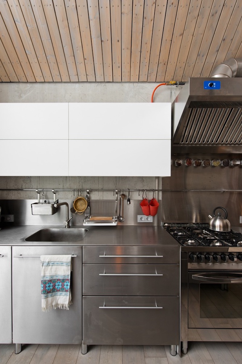 The stainless steel counters and cabinets are both hygienic and visually imposing 