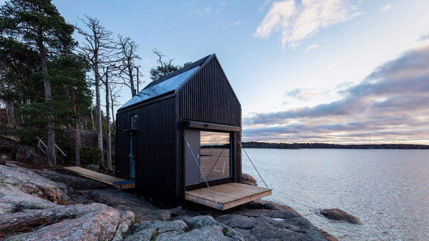 Little seaside cabin on the rocks