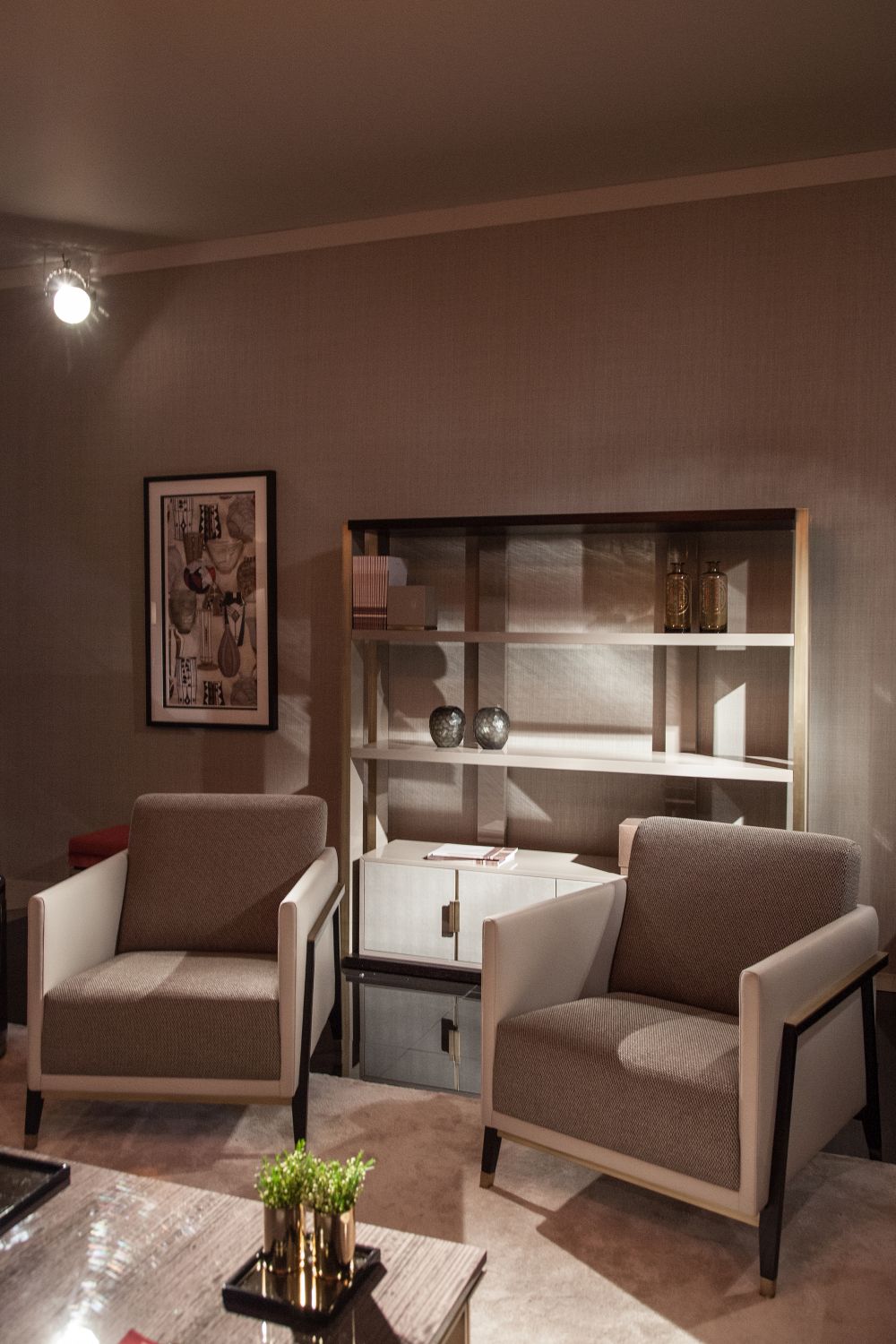 A shelving unit can be very practical in a reading nook and can even eliminate the need for a table