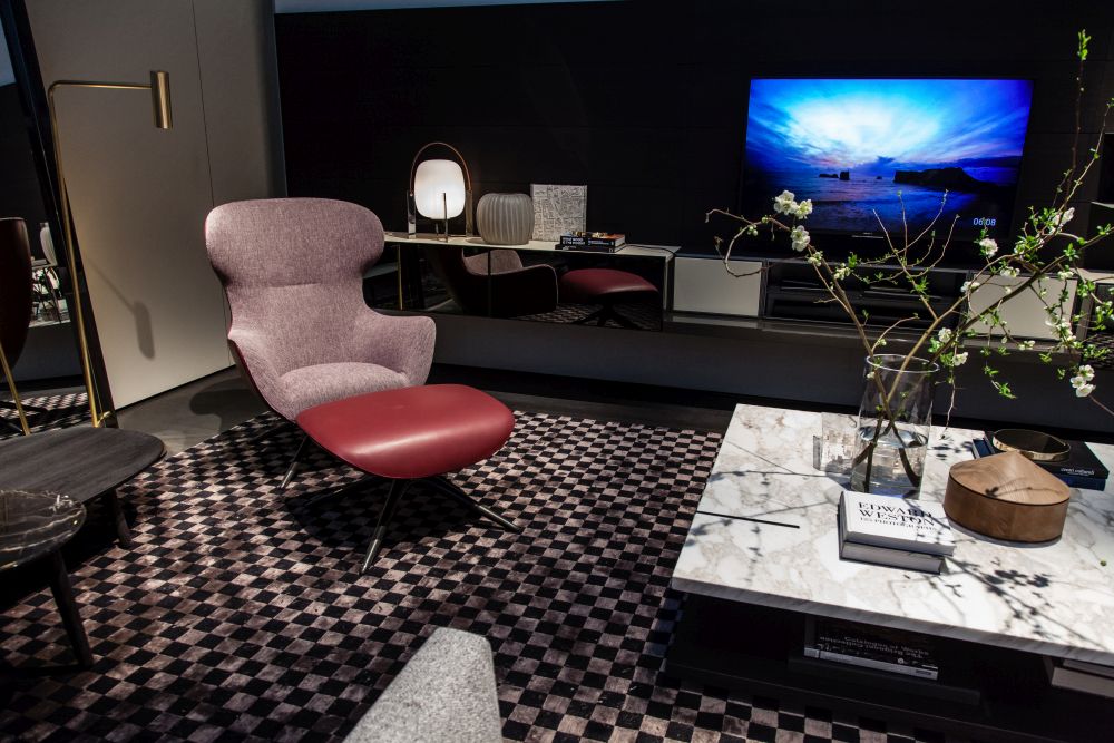 Living room decor with reading chair and large marble table