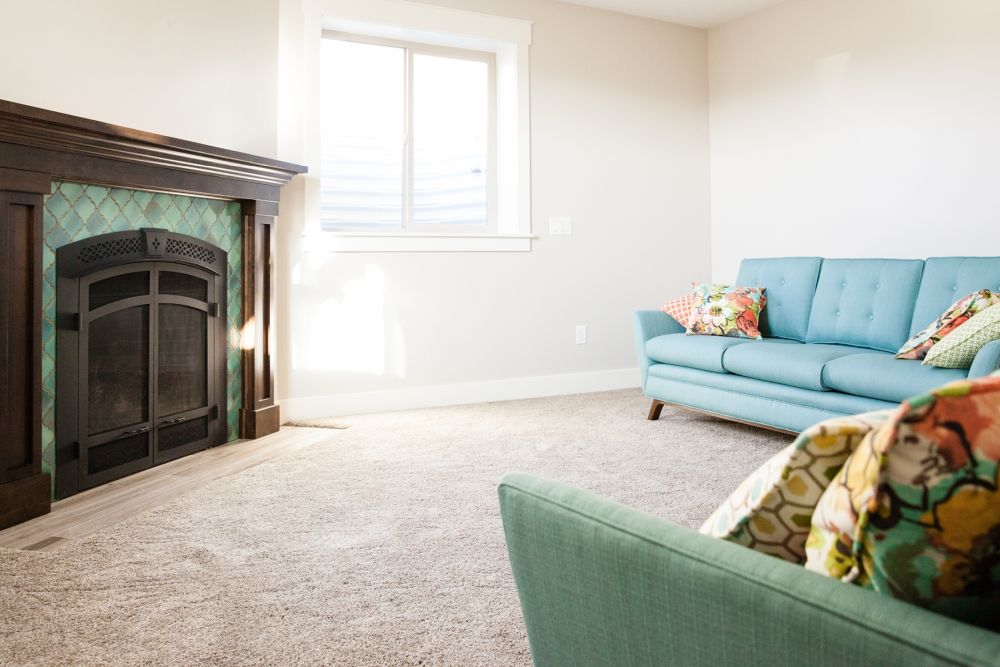 Living room fireplace with turquoise tiles