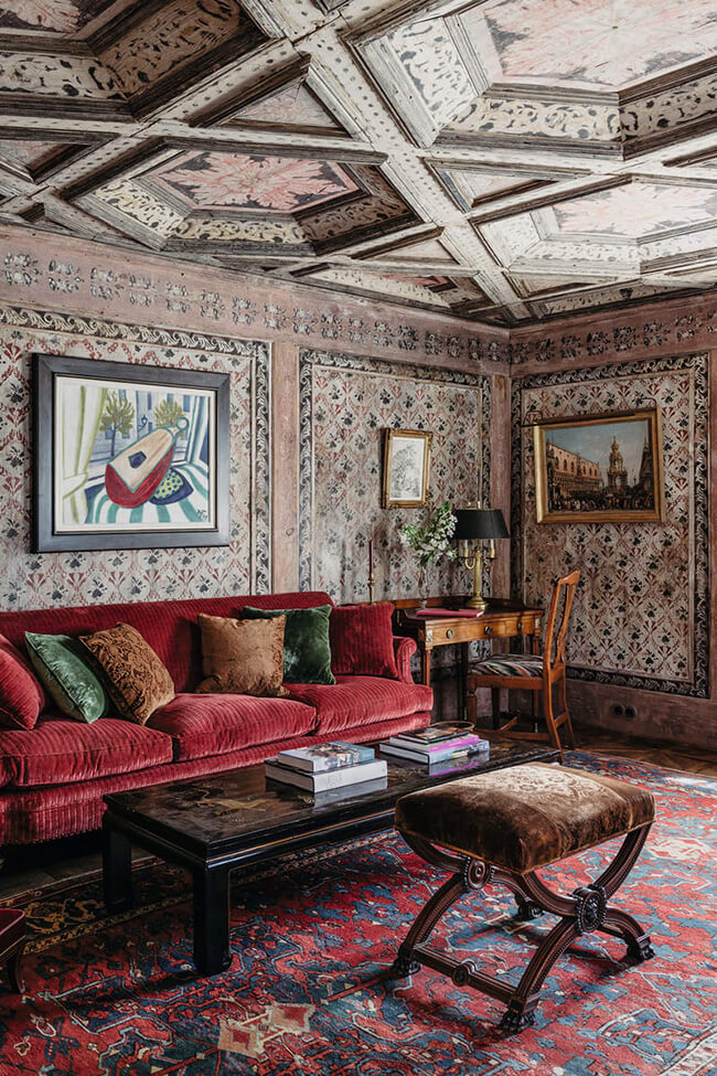 Living room with flowered wallpaper